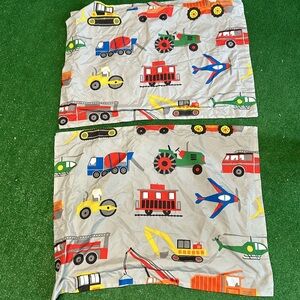 Two really cool pillow covers! Transportation and construction themed! 24X30 in